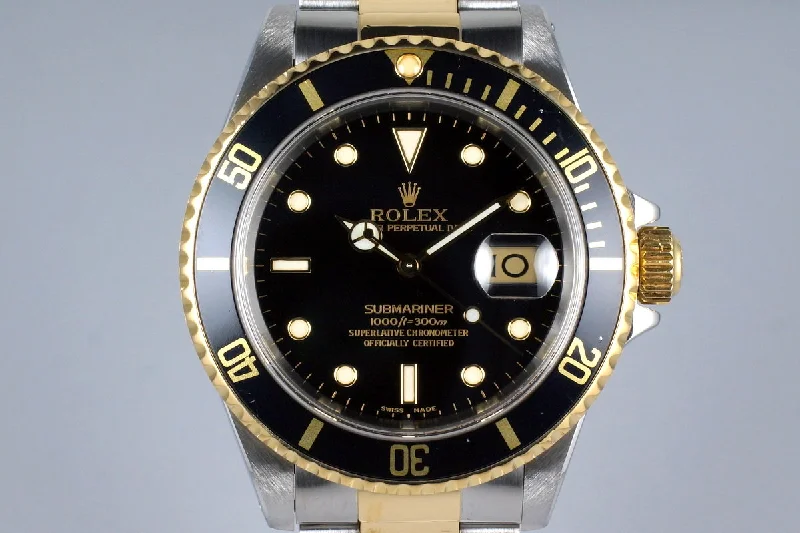 Discover Rolex Timepieces –1991 Rolex Two Tone Black Submariner 16613 with Box and Papers