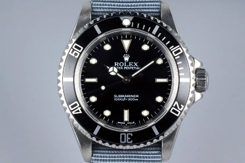 Explore Rolex Watches with Style and Precision –1995 Rolex Submariner 14060 Service Dial