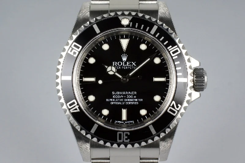 Explore Rolex’s Legendary Timepieces –2012 Rolex Submariner 14060M 4 Line Dial with Box and Papers