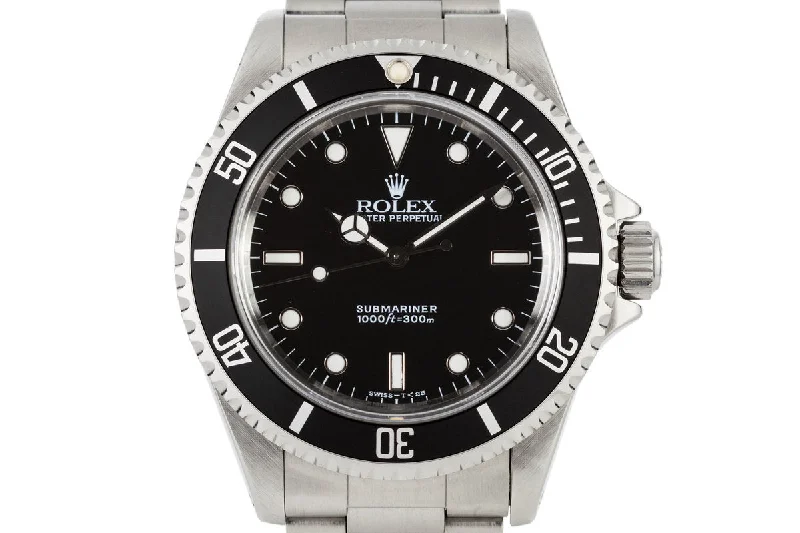 Discover Rolex Timepieces –1995 Rolex Submariner 14060 with Box and Papers