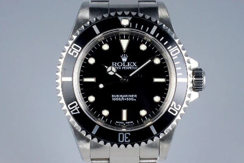 Discover the World of Rolex Watches –2002 Rolex Submariner 14060M with Box and Papers