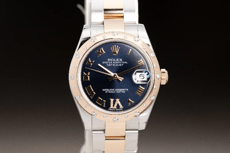 Find Iconic Rolex Timepieces for the True Collector –2018 Rolex 178341 31mm DJ 18k RG/St Bracelet, Deep Navy Dial, Gold & Diamond Roman Numeral & 24 Diamond Bezel w/ B+C