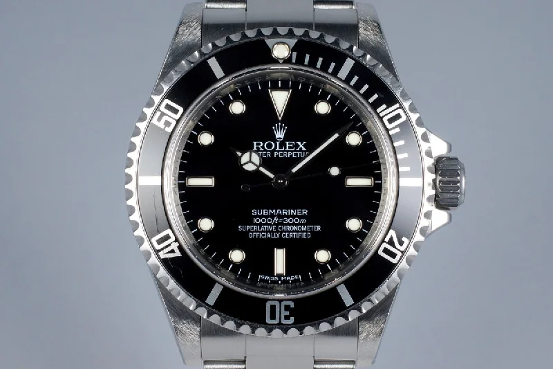 Rolex Watches: Precision Meets Perfection –2009 Rolex Submariner 14060M 4 Line Dial