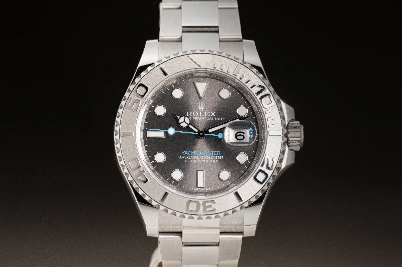 Find Rare Rolex Models for Exclusive Style –2018 Rolex ST/St & Platinum 40mm Yacht-Master Dark Rhodium dial Blue Sweep Hand Box, Card, hangtags, Wallet & Booklets