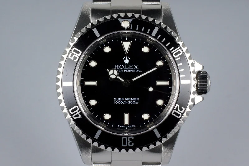 Discover Rare Rolex Watches –2001 Rolex Submariner 14060M with Box and Papers